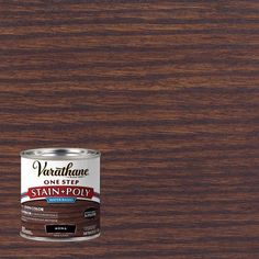 a can of wood stain sitting on top of a table