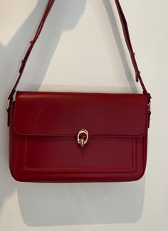 Vintage style cherry red leather bag. Super cute pair it up with a white shirt and blue jeans  This bag can be worn as a shoulder bag or cross body whatever suits your preference. White Shirt And Blue Jeans, Chocolate Dishes, Buckle Bag, Red Leather Bag, Wedding Bags, Buckle Bags, Red Handbag, Wedding Bag, Accessories Bags Purses