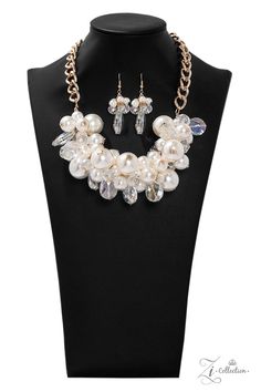 Captivate An oversized gold chain gives way to an exaggerated cluster of bubbly white pearls, glassy crystal-like beads, and prismatic crystal teardrops. The dramatic fringe converges below the collar, creating a breathtaking statement piece. Features an adjustable clasp closure. Sold as one individual neckla... Aka Sorority, Signature Necklace, Pearl Necklace Earrings, White Pearl Necklace, Teardrop Beads, Paparazzi Accessories, White Necklace, Affordable Jewelry, Paparazzi Jewelry