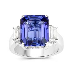 Ross-Simons - 9.75ct Tanzanite Ring, .35ct t.w. Diamonds in 18kt White Gold. Size 8. With a splashy color and generous size, this 9.75 carat octagonal brilliant-cut tanzanite invites you to make an unforgettable entrance every time you wear it. At each side of the big gem, .35 ct. t.w. rectangular baguette diamonds add classic shimmer. Set in polished 18kt white gold. 5/8" wide. Diamond and tanzanite ring. Baguette Diamonds, Tanzanite Ring, Fine Jewelery, Baguette Diamond, Baguette, Snow Globes, Entrance, Jewelry Rings, Fine Jewelry