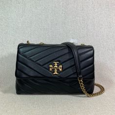 Brand New Never Been Carried Outlet Item With Minor Imperfections But In Very Good Overall Condition. Final Sale Item So Tag Was Removed To Prevent Store Returns. You Are Looking At An Adorable Small Black Leather Kira Chevron Convertible Shoulder Bag/Cross Body Bag By Tory Burch Fast Shipping !! Arrives In 2-3 Business Days. Authentic Guaranteed By Money Back. Feel Free To Verify Authenticty At Any Tory Burch Location. Please See All 12 Pictures And Read The Entire Description Before Placing Yo Kira Chevron Convertible Shoulder Bag, Navy Purse, Tory Burch Shoulder Bag, Kira Chevron, Tory Burch Purse, Brown Leather Crossbody Bag, Xmas List, Flap Shoulder Bag, Tory Burch Handbags