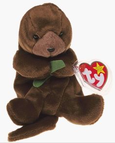 a brown teddy bear with a heart tag