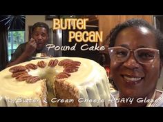 a woman standing in front of a cake with pecans on it and the words butter pecan pound cake