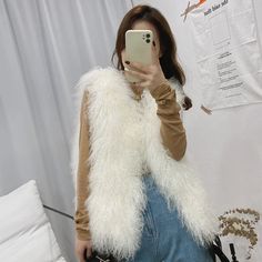 SPECIFICATIONSBrand Name: TONFURAge: MIDDLE AGEThickness: ThickStyle: High StreetOrigin: Mainland ChinaCN: ZhejiangFabric Type: blendedSeason: WinterHign-concerned Chemical: NonePattern Type: SolidMaterial: FurMaterial: Mongolia Sheep FurDecoration: FurRelease Date: FW2022Type: SlimClothing Length: regularPlace Of Origin: China (mainland)Model Number: tsr801Fabric content: 96% and aboveCollar: V-NeckClosure Type: HOOKSleeve Style: regularHooded: NoCraft\Technics: Natural ColorStyle: Thick Warm F Fur Vest Women, White Fur Coat, Boho Picnic, Butterfly Blouse, Elegant Maxi Dress, Vest Women, Faux Fur Vest, Chunky Crochet, Floral Midi Skirt