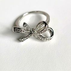 New - No Box, No Card, No Tags Crystal Bow Statement Ring. Bundle Jewelry Items With The Star Icon In The Listing Title For A Better Deal! Bundle 3 Items, Buy 2, Get The Third One Free + Discounted $4.99 Shipping Or Bundle 6 Items, Buy 4, Get 2 Free + Free Shipping This Item Is Brand New However, This Item Is Pre-Owned, It Has Been In A Retail Setting, It May Have Been Handled By Customers Or Tried On, And May Show Signs Of Such. It Does Not Come With Tags But Will Come Sealed/Packaged. Note: Pl Elegant Zara Jewelry For Wedding, Elegant Zara Jewelry For Gifts, Star Icon, No Card, Bow Ring, Silver Crystal, Womens Jewelry Rings, Statement Ring, The Star