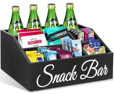 a snack box filled with lots of different types of food and drinks on top of each other