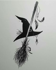 a drawing of a witch's hat and broom