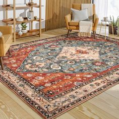 a living room filled with furniture and a large rug