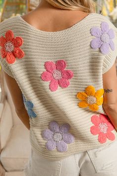 Details Brand: BiBi Knitted Sweater Vest Solid Color Multi Jeweled Crochet Flower Patches Round Neckline Sleeveless Unlined Material 100% Cotton Care Instructions Hand Wash Cold, Lay Flat to Dry, Iron if Needed Measurements of Garment Bust of the garment is measured armpit to armpit and then doubled. Length of the garment is measured from the top of the shoulder to the bottom of the hem line. Sleeve Length of the garment is measured from the top part of the shoulder seam to sleeve opening. Waist Cute Crochet Sweater For Spring, White Hand Knitted Crochet Top For Spring, Handmade Knit Tops For Spring, Spring Cream Crochet Top With Knit Fabrication, Hand Knitted Beige Sweater For Spring, Beige Hand Knitted Sweater For Spring, Beige Crochet Lace Sweater For Spring, Cream Crochet Top With Knit Fabrication For Spring, Crochet Knit Sweater Vest For Spring