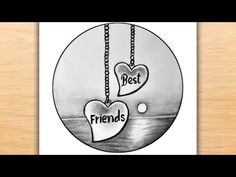 a drawing of two hearts with the words best friends hanging from it's side