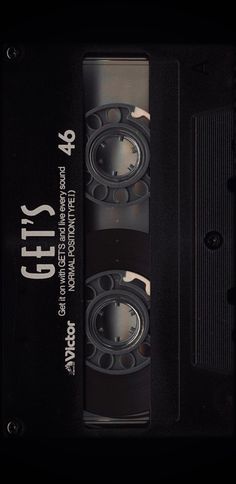 an old black cassette with the words city 94 on it's front and side