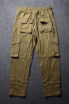 Casual Cotton Straight Cargo Jeans, Urban Style Cotton Cargo Pants With Pockets, Cotton Cargo Jeans In Straight Fit, Urban Cotton Cargo Pants With Pockets, Cotton Cargo Pants With Multiple Pockets And Tapered Leg, Cotton Tapered Leg Cargo Pants With Multiple Pockets, Khaki Cotton Straight Cargo Jeans, Straight Cotton Cargo Jeans With Hip Pockets, Urban Straight Leg Cotton Cargo Pants