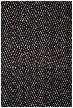 a black and white rug with diamonds on it