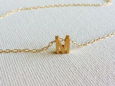 Tiny Gold Initial Necklace  Gold Letter Necklace by HLcollection, $26.00 Minimalist 14k Gold Filled Initial Necklace Gift, Simple Gold Initial Necklace For Everyday, Gold Minimalist Initial Necklace, Minimalist 14k Gold Filled Initial Necklace, Simple Gold Necklaces With Initials, Dainty Gold Charm Necklace For Bridesmaid Gift, Minimalist Gold Initial Necklace For Bridesmaids, Gold Minimalist Initial Necklace For Bridesmaids, Tiny Gold Initial Necklace For Everyday