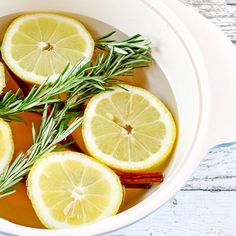 lemon and rosemary stovetop potpour in a white bowl