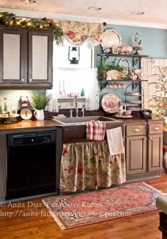 the kitchen is decorated for christmas with festive decor