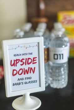 a sign that reads reach into the upside down and find barb's glasses