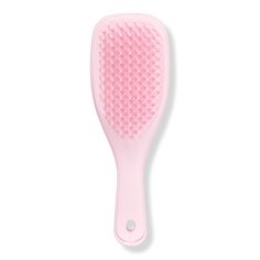 The Mini Ultimate Detangler Hairbrush - MINI ULTIMATE DETANGLER MILLENNIALBenefitsPatented teeth have two-tiered technology with added flex for wet hair. The long, flexible teeth detangle, removing knots and reducing breakage, while the short teeth smooth, for glossy, frizz-free hair.Although small, it confidently detangles any type of hair, helping to reduce hair breakage.You can use on dry or wet hair, it's great for detangling ends and fringes and for distributing conditioning treatments through wet hair.FeaturesThe Ultimate Detangler is the perfect size for travel, and has a savvy keyring hole on the handle that allows you to clip to your bag.Don't be fooled by the size, this hairbrush confidently detangles wet and dry hair. - The Mini Ultimate Detangler Hairbrush Preppy Hair Brush, Coquette Hair Products, Mini Tangle Teezer, Pink Hairbrush, Tangle Teezer Brush, Tangle Teaser, Pink Hair Brush, Mini Hairbrush, Short Teeth