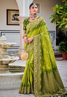 Light green silk saree with blouse 5101  Desc:  Color : Light Green Fabric : Silk Work : Embroidery Wash Care : Dry clean Sleeve Style : Half Sleeve Long Sleeves : Done only in Custom Stitch Sleeves Lining : Done only in Custom Stitch Bust Size : 32 to 42 Inches Occasion : Wedding   Festival   Diwali   Mehendi   Sangeet   Engagement   Reception   Ceremonial. With Express Free Shipping and Custom Stitching, Buy Special silk Saree Party wedding wear dresses Light green silk saree with blouse 5101 Raw Silk Fabric, Lime Yellow, Ladies Blouse Designs, Utsav Fashion, Wedding Saree Indian, Designer Sarees Online, Embellished Blouse, Art Silk Sarees, Banarasi Saree