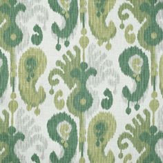 a green and white pattern on fabric