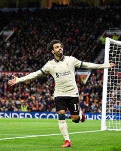 the soccer player is celebrating after his goal