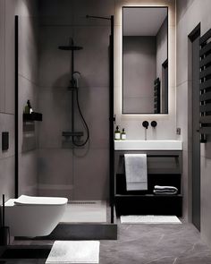 a white bath tub sitting next to a bathroom sink under a mirror and shower faucet