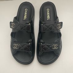 Gorgeous Coveted “Dad” Sandals Purchased At Bal Harbor Chanel Store On 7/5/2024 Worn Only Once And Are Slightly Large So Selling In Hopes Of Finding A Smaller Pair. Wear On Soles - Otherwise Pristine Condition. Just Trying To Make My Money Back (Or Close). Comes With Authenticity Cards/Box/Dust Bags/Receipt. Luxury Sandals With Cushioned Footbed And Round Toe, Designer Flat Heel Sandals With Leather Footbed, Designer Closed Toe Sandals With Leather Footbed, Luxury Flat Sandals With Leather Footbed, Designer Flat Sandals With Leather Footbed, Classic Slides With Leather Sole And Round Toe, Luxury Leather Sole Slides With Round Toe, Luxury Slides With Round Toe Leather Sole, Luxury Slides With Leather Sole And Round Toe