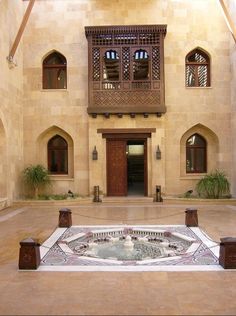 a large building with a fountain inside of it