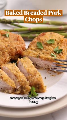 baked pork chops on a plate with asparagus