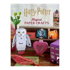 the cover of harry potter magazine with paper crafts on it and an owl in front