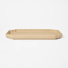 an empty brown paper tray on a white background