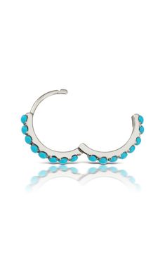 Designed by the famed NYC piercing studio, a tiny 14-karat-gold hoop to wear anywhere along the ear boasts an unbroken line of turquoise beads. Sold as a single earring 1/2" hoop diameter Snap-post closure Best suited for earlobe and helix piercings Hypoallergenic 14k gold/turquoise Imported Turquoise Sterling Silver Huggie Jewelry, Stackable Sterling Silver Hoop Earrings Fine Jewelry, Stackable Sterling Silver Hoop Earrings, Turquoise Sterling Silver Small Hoop Jewelry, Sterling Silver Turquoise Single Earring, Turquoise Sterling Silver Single Earring, Turquoise Single Small Hoop Earring, Helix Piercings, Maria Tash