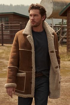 Taking its design cues from the American West, the Maverick shearling coat from the Heritage Collection carries on the tradition of a well-known style. The coat is artisan crafted of durable South African sheepskin and has all the details you would expect from a classic rancher, including fur-out cut lines, a notch collar, and natural corozo buttons. Expertly crafted to fend off the cold, the Maverick is an essential that you'll wear for many years to come. Shearling Coat Womens, Sheepskin Vest, Mens Fashion Rugged, Long Winter Coats, Sheepskin Coat, Winter Mode, American West, Notch Collar, Shearling Coat