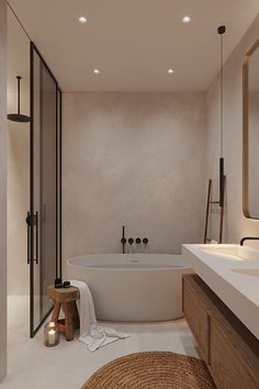 a bathroom with a large white tub next to a walk in shower