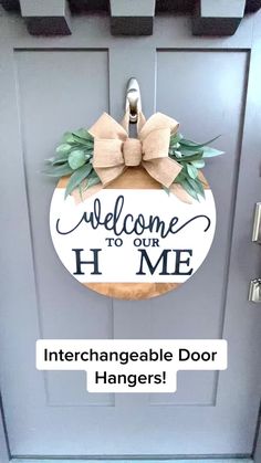 a welcome sign is hanging on the front door