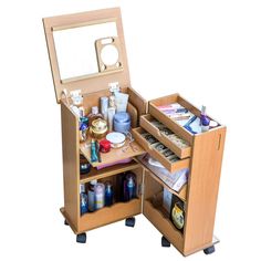 an open wooden makeup cabinet with drawers