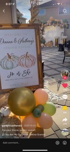 an image of a sign with balloons in front of it