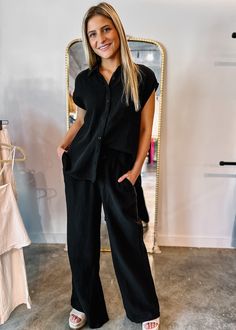 Give your jeans a break this season, and opt for the Rowan Gauze Wide Leg Pants instead! Featuring a relaxed fit and season-appropriate wide legs. Great length to wear with wedges or sneakers. Wear them now with a white body suit, then transition it into fall with matching button front top. True to size, relaxed fit Size down if between sizes Olivia is wearing small Offered in taupe and black Elastic waist with drawstring Pockets Fully lined 100% Cotton Fabric has no stretch White Body Suit, Gauze Pants, Gauze Top, Button Front Top, Great Lengths, Oversized Silhouette, Wide Legs, Black Button, Body Suit