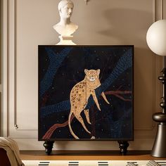 a painting on a wall in a living room next to a busturine and lamp