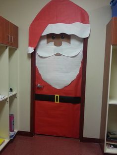 an image of santa claus door decoration on instagram for the holiday spirit day party