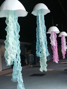 some very pretty jellyfish like decorations in a room