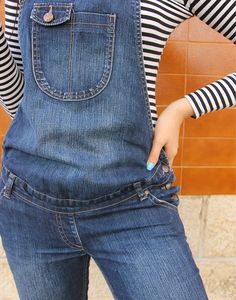 Maternity long dungarees in blue. Pocket to bib. Front and back pockets. Belt loops. Adjustable waist to adapt as you grow. Size M/L, UK 10-16 / EU 38-44. Measurements - 8"(24cm) top of bib - 16"(41cm) bottom of bib - 38"(97cm) adjustable waist - 38"(97cm) hips - 25"(64cm) inner leg - 6"(15cm) rise. Material - Cotton Condition - Excellent. Sustainability - Vintage. Handpicked, repaired and ready to wear. This is an original vintage item, not new and minor signs of wear & age are expected, we wil Denim Blue Overalls With Side Pockets, Full Length Medium Wash Overalls With Pockets, Medium Wash Bib Front Overalls With Side Pockets, Medium Wash Overall Pants With Pockets, Dark Wash Full Length Overalls With Pockets, Denim Blue Bib Front Shortalls With Pockets, Blue Overalls With Pockets, Blue Shortalls With Pockets, Blue Bib Front Bottoms With Pockets