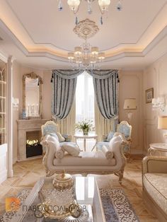 an elegant living room with chandelier and couches