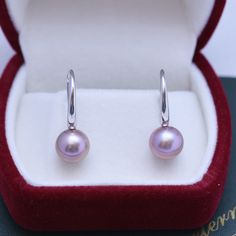 Freshwater pearls shimmer with very light overtones and classic purple body color seamlessly forming a single row of style distinction--an elegant look that only pearls can truly offer, setting them apart from any other gemstone or fine jewelry design. Materials: AAAA Freshwater Pearls, Size 9-10mm, 925 sterling silver A FREE luxury jewelry box is included for high-quality pearl items. Product Information Pearl Type Freshwater Origin China Shape Round Quality AAAA Size 9-10 mm Nacre Very Thick C Purple Pearl Jewelry For Formal Occasions, Elegant Purple Pearl Earrings, Formal Purple Pearl Drop Earrings, Elegant Purple Pearl Earrings For Formal Occasions, Elegant Purple Hypoallergenic Earrings, Purple Pearl Formal Jewelry, Formal Purple Pearl Jewelry, Elegant Purple Pearl Earrings For Anniversary, Purple Round Pearl Earrings For Gift