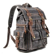 Perfect canvas backpack for school, working, traveling and daily using. 
 
Generous enough to accommodate the magazine, laptop, tablet, glasses, wallet, keys, earphone, power bank, cell phone, document and clothes. It will be a perfect work travel school bag for Men, Women, High School and College Student.  Imported oil wax canvas can withstand temperature up to 70 degrees Celsius, has good waterproof function, durable wear and dirt resistance, heat and temperature resistance and low temperature Vintage Black Backpack For Travel, Black Cotton Backpack With Pockets, Black Canvas Travel Backpack, Casual Rectangular Waxed Canvas Backpack, Travel Black Canvas Backpack, Black Waxed Canvas Travel Backpack, Casual Black Backpack With Waxed Finish, Casual Black Waxed Backpack, Casual Leather Backpack With Waxed Canvas For School