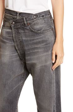 A deconstructed, asymmetrical front lends a cool industrial vibe to faded and whiskered black jeans cut with a flattering high waist and easy straight leg. 27" inseam; 16" leg opening; 15" front rise; 16 1/2" back rise (size 29) Zip fly with asymmetrical button closure Five-pocket style 100% cotton Machine wash, line dry Made in Italy SPACE: A shop for emerging and advanced designers Crossover Jeans, Nordstrom Store, Black People, Crossover, Black Jeans, Straight Leg, High Waist, Nordstrom, High Waisted