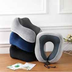 three pillows sitting on top of each other