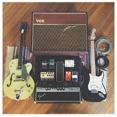 an electric guitar, amp and other musical equipment