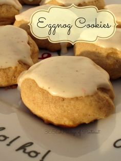 eggnog cookies with icing on a white plate and black writing in the background