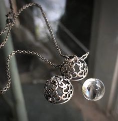 "🕊 Caged Pools Of Light Sterling Locket Pendant Necklace 🕊 Un-Drilled 14.3mm Genuine Himalayan Rock Crystal Quartz Orb Enclosed in Hinged Oxidized Sterling Ball Locket  🕊 with 1.5mm wide link Chain 20\" - If you need a longer or shorter chain just ask and I will give you the price/s 🕊 So Clear You Can See The World Up Side Down - High Altitude 14.3mm Rock Crystal Quartz orbs without inclusions - NOT GLASS! 🕊 Everything is Nickel Free Solid Sterling Silver 🦋 A PRETTY GIFT BOX IS INCLUDED WITH YOUR PURCHASE  🌈 GUARANTEE All my workmanship is guaranteed - if something comes un-done due to workmanship defect please convo me about how to proceed. ALL GEMSTONES THAT COME FROM MY GEMSTONE CUTTERS ARE TESTED AND GUARANTEED TO BE WHAT THEY ARE LISTED AS ❖ All measurements are approximate wit Locket Chain, Crystal Ball Necklace, Caged Necklace, Locket Pendant Necklace, Artisan Gift, High Altitude, Pretty Gift, Crystal Quartz, Rock Crystal